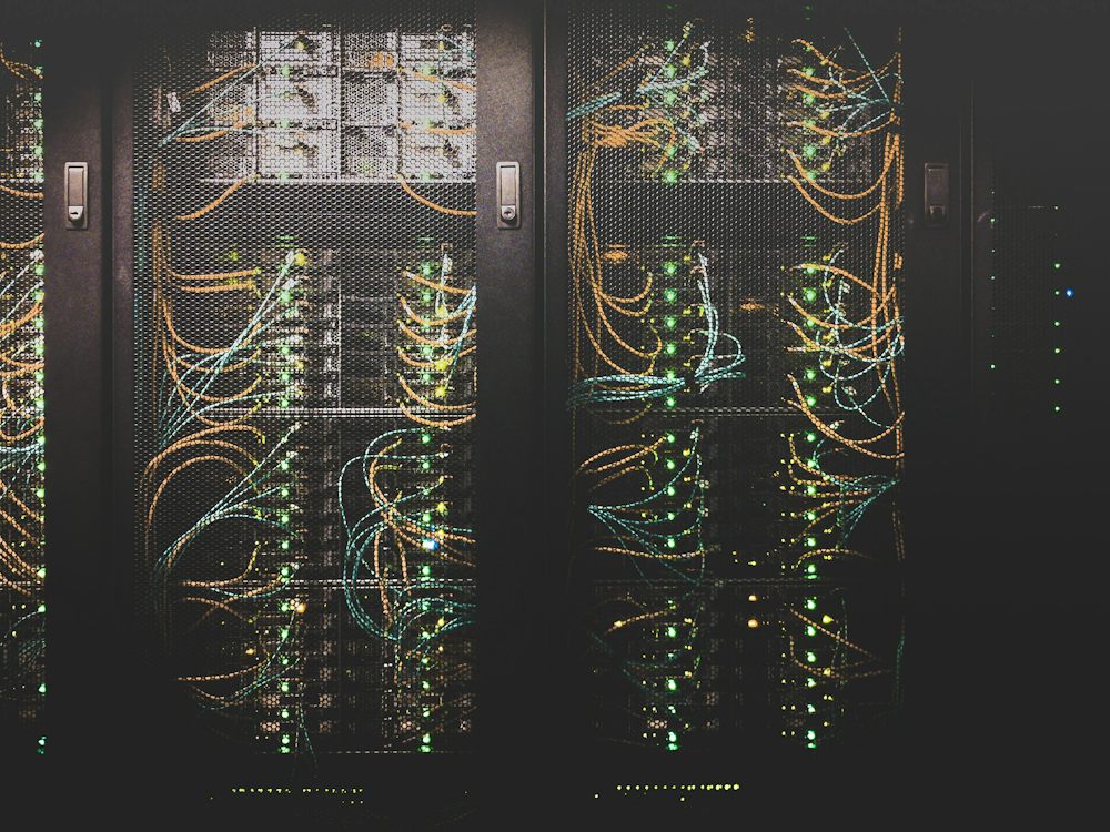 Server racks with network cabling in a data center